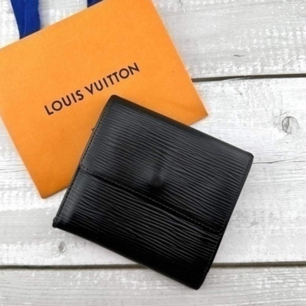 AUTHENTIC Louis Vuitton Marco Wallet. Color: Black